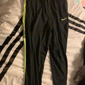 2 pairs of Boys Nike sweatpants.